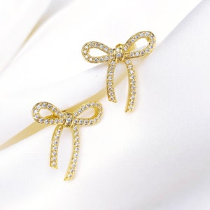 Gold fashion earrings bow shape with zirconium crystals – Bow shapes earrings