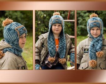 Knitted scarf cap. The unusual universal model is two in one. Knitted hat child. Winter knitted hat for a child. Warm knitted hat for a boy.