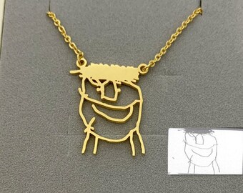 child drawing jewellery