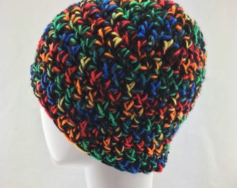 Crochet rainbow and black coloured messy bun or ponytail hat