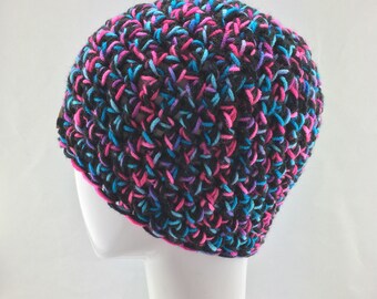 Crochet black pink and blue messy bun or ponytail hat