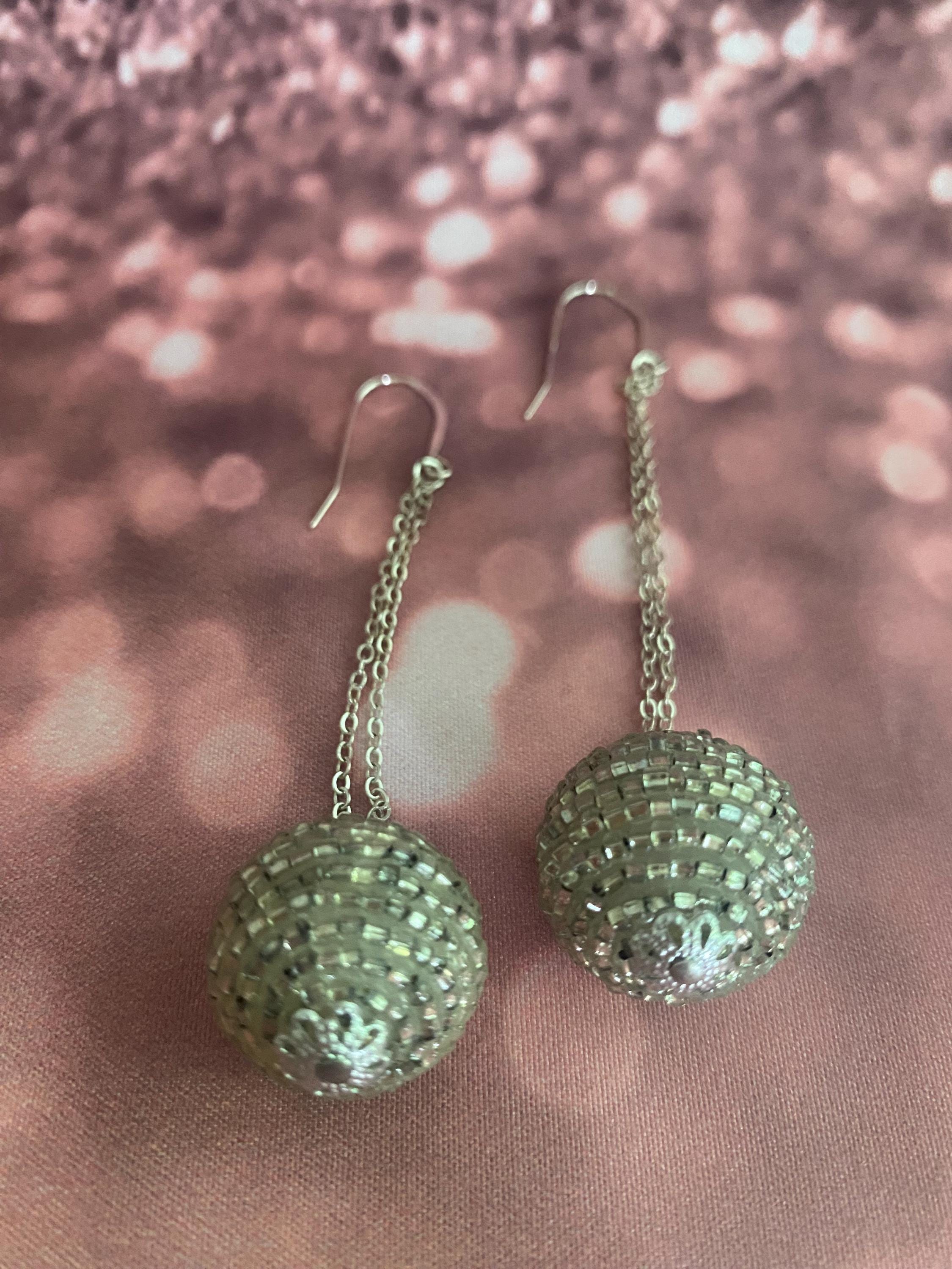 Assymetrical disco ball earrings