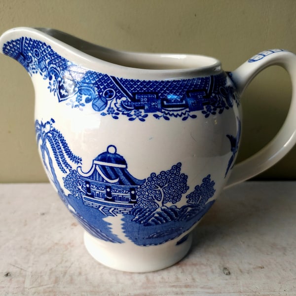 Lovely 5 1/2" water pitcher/milk jug in "Willow" Pattern by Woods and Sons, Woods Ware. Chinoiserie blue and white transferware. Lovely gift