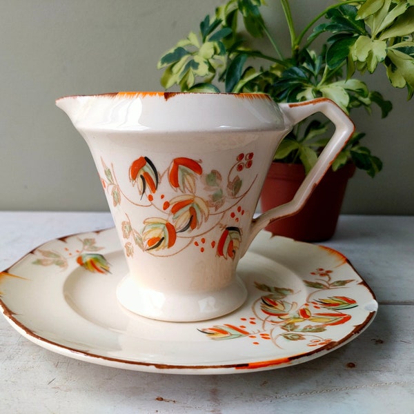 Lovely ceramic indoor planter. Made from pretty hand painted milk jug/creamer and side plate. Art deco design autumn pattern from 1920/30's.