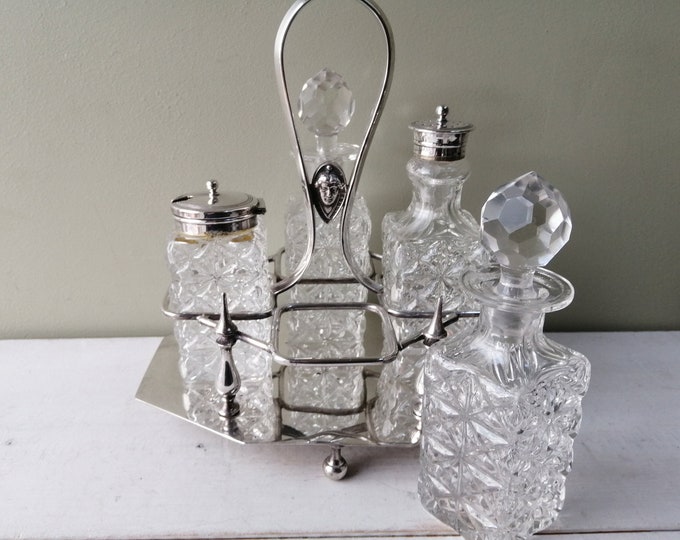 Cut Glass Cruet Set in Silver Plated Stand. 2 Glass Bottles