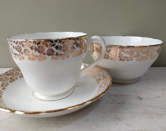 Lovely vintage bone china Adderley tea cup, saucer and sugar bowl. Simple elegant design, white with gold detail. Lovely Wedding decor.