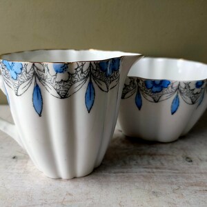 Lovely hand painted sugar bowl and creamer/milk jug by Mayer & Sherratt Melba Bone China. Blue Floral pattern and gold detail. Lovely gift image 5