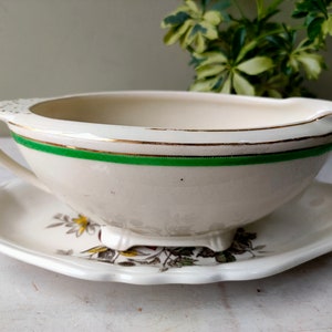 Lovely ceramic planter made from J and G Meakin Sol Westminster pattern gravy/sauce boat and Gainsborough under plate. Perfect cache pot.