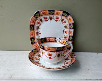 Gorgeous Trio of Side plate, teacup and saucer by John Shaw and Sons (Burlington), cobalt blue and orange floral Imari pattern. Lovely gift.