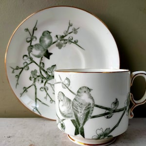 Gorgeous bone china large tea cup and sauce in Almonds Pattern by George Jones. Antique Victorian transferware, birds and blossom design.