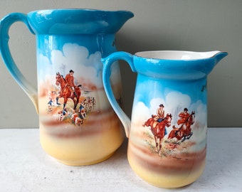 Lovely pair of 1920's Falcon Ware (SylvaC) jugs/vases by T. Lawrence & Grundy with hunting scenes. Horses and hounds pitchers. Lovely gift.