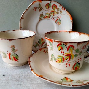 Tea for 2! Lovely vintage hand painted teacups and octagonal saucers. Art deco design autumn pattern from 1920/30&#39;s. Lovely gift.