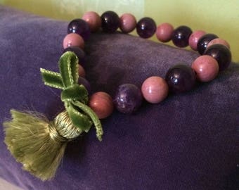 Amethyst bracelet and rhodochrosite, silk tassel.