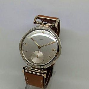 Longines Switzerland wristwatch vintage 1944 mechanical 17 jewels, engraved case. Serviced and running great!