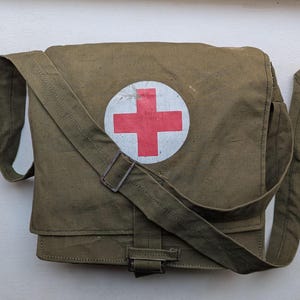 Soviet vintage military 70s First Aid Bag was captured from russian forces recently, Red Cross medical canvas bag. Made in USSR.