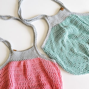 May include: Two crocheted tote bags, one in pink and gray and the other in green and gray. The bags have a simple, textured design.