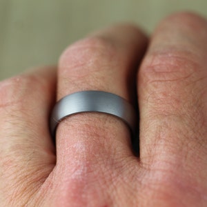tantalum wedding ring on hand with free engraving