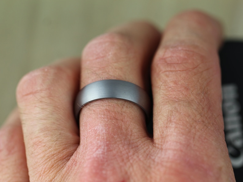 tantalum wedding ring on hand with free engraving