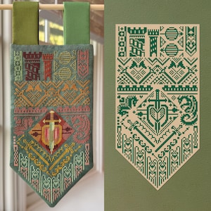 May include: A green and tan banner with a medieval design. The banner features a sword, castle, and geometric patterns in shades of green, red, and yellow. The banner is hanging from a wooden rod.