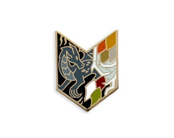 May include: A gold-edged enamel pin in a shield shape. The left side features a gray dragon on a black background. The right side has a patchwork design in white, red, green, and gold. A unique accessory.