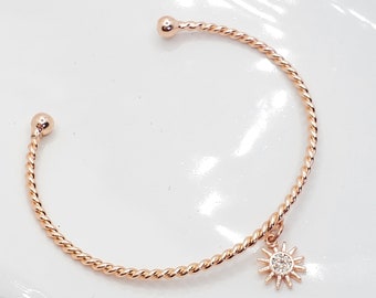 Soleil d’or rose avec le bracelet de CZ