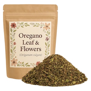 May include: A brown paper bag with a label that reads "Oregano Leaf & Flowers (Origanum vulgare)". The bag is filled with dried oregano leaves and flowers.