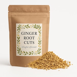 May include: A brown paper pouch containing dried ginger root cuts. The white label features a green leaf and yellow flower border with the text GINGER ROOT CUTS (Zingiber officinale). A pile of small, tan, irregular ginger pieces sits in front.
