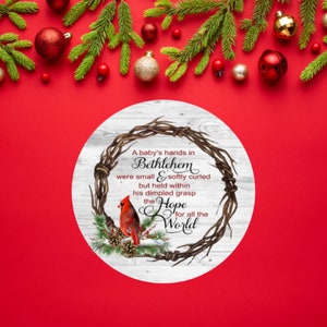 A Baby's Hand in Bethlehem Cardinal Aluminum Wreath Sign