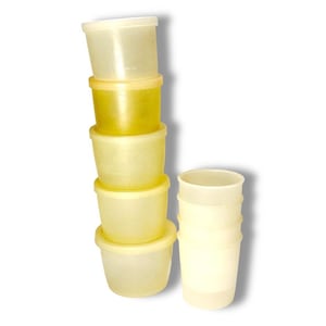 May include: A stack of five small, round, yellow-tinted plastic containers with lids, and a stack of five matching tall, cylindrical containers. The containers are made of a translucent plastic material.