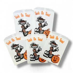 May include: Five white paper Halloween treat bags. Each bag features a black cat wearing sunglasses and a bow tie, pointing with its paw, and a jack-o'-lantern. The words "Trick Or Treat" are printed in orange.