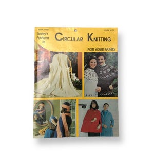May include: A vintage instructional booklet titled Today's Fashions in Circular Knitting for Your Family, featuring a yellow cover with photographs of knitted garments including a white blanket, patterned sweaters, a red cape, and a blue coat.