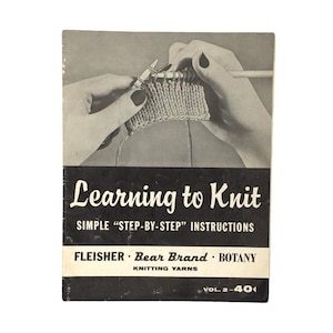 May include: Vintage knitting instruction book titled "Learning to Knit" with the subtitle "Simple Step-by-Step Instructions." The cover features a black and white image of hands knitting. The book is from Fleisher, Bear Brand, and Botany.