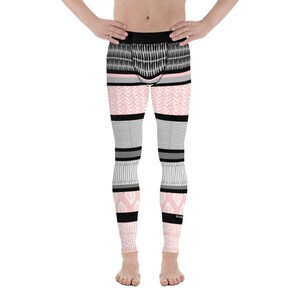 May include: Black, gray, and pink patterned leggings with a geometric design.