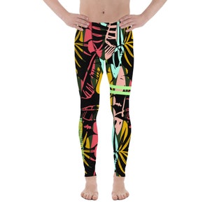 May include: Black leggings with a colorful tropical leaf print. The print features pink, green, yellow, and blue leaves on a black background.