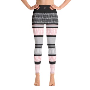 May include: Black, pink, and gray patterned yoga leggings with a high waist.
