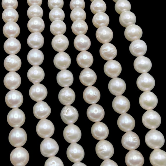White Color NRD014 Freshwater Pearls 6-6.5mm Off Round White Color NRD014 Freshwater Pearls 6-6.5mm Off Round