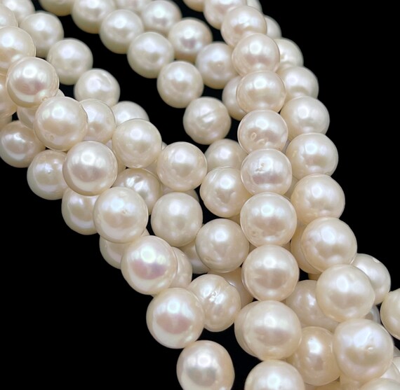 White Color NRD014 Freshwater Pearls 6-6.5mm Off Round White Color NRD014 Freshwater Pearls 6-6.5mm Off Round