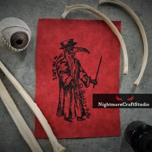 May include: A red fabric patch with a black and white illustration of a plague doctor wearing a long coat, a mask with a long beak, and a hat. The text "LOFT vs MIND" and "CL. NICALLY FINE" are printed vertically on the left side of the patch. The text "NightmareCraftStudio" is printed in white on a red background at the bottom of the patch.