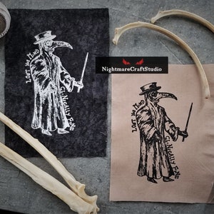 May include: Two black and white images of a plague doctor with a long beak mask and a hat. The text "Lost My Mind" and "Clinically Fine" is written on the images. The images are printed on fabric.