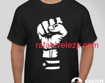 Puerto Rico Black Resistance Flag/Fist T-Shirt, Youth Sizes Available! Free Matching Sticker and Shipping when you order now!