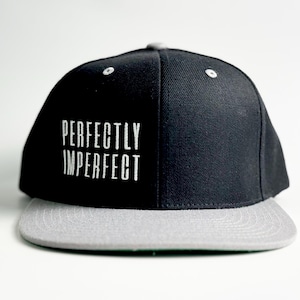 two-tone snapback hat with custom embroidery