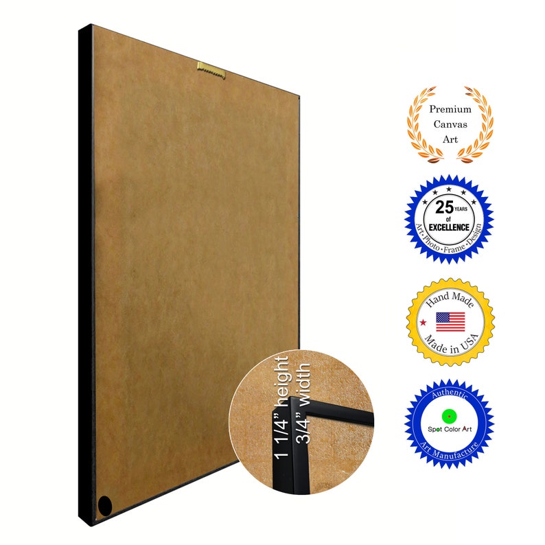 May include: A brown framed canvas print with black trim. The print is 1 1/4 inches high and 3/4 inches wide. The frame has a black hanging wire on the back.