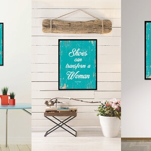 May include: Three turquoise blue framed prints with a white distressed wood background and white text that reads "Shoes can transform a Woman".