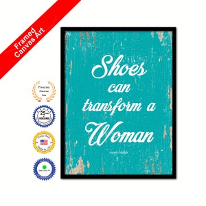 May include: Framed canvas art print with a turquoise blue background and white text that reads "Shoes can transform a Woman" with the name "Manolo Blahnik" in smaller white text below.