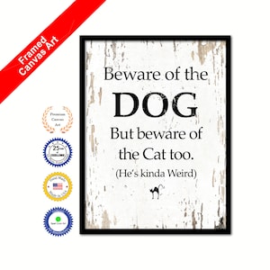 May include: A white wood sign with black text that reads "Beware of the DOG But beware of the Cat too. (He's kinda Weird)". The sign has a black cat silhouette at the bottom.