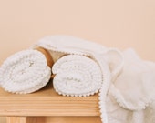 Organic Bamboo Swaddle Blanket with White Pom Pom Edge