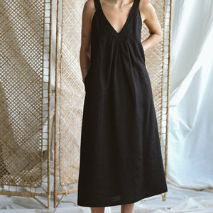 Black deep V-neck sleeveless dress / ManInTheStudio