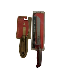 May include: Two kitchen knives in their packaging. A 7-inch bread knife with a serrated blade and a red handle is in a clear plastic package with a red and white label that says "7-inch Bread Knife". A paring knife with a gold handle is in a clear plastic package with a red and white label that says "Paring Knife".