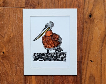 Pelican wearing a rusty orange jumper - handmade original linocut art print