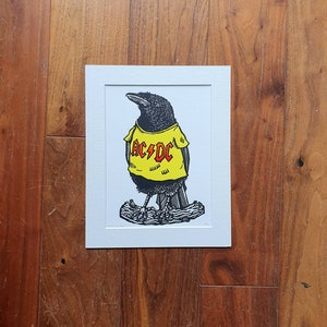Crow in a band t shirt - handmade linocut bird fan art print